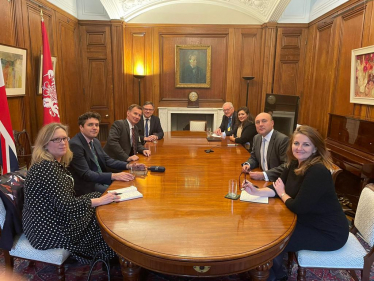 Our MP Caroline Ansell pictured with the Chancellors and Ministers seated together, holding a discussion. 