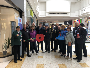 Poppy selling Conservative Councillors and volunteers. Beacon, Eastbourne Town Centre